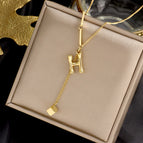 H gold color